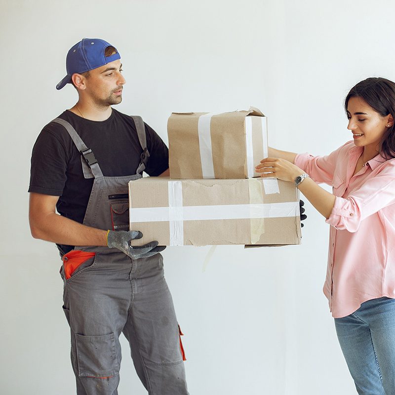 Family repairs. Couple at home. Woman in a pink blouse